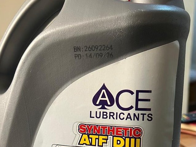 Batch number BN 26092264 and production date PD 14/09/26 printed on an Ace Synthetic ATF DIII pack